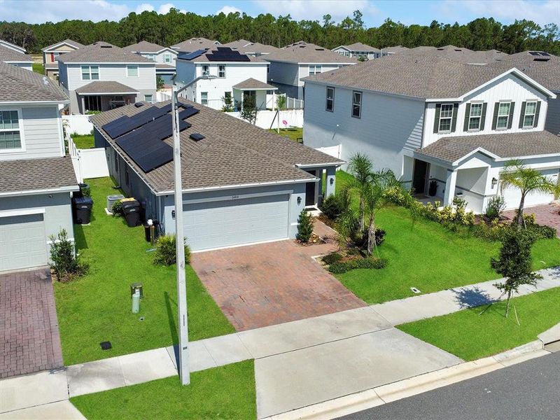 Front exterior of a new home in , Davenport, FL, highlighting curb appeal (Image 23).
