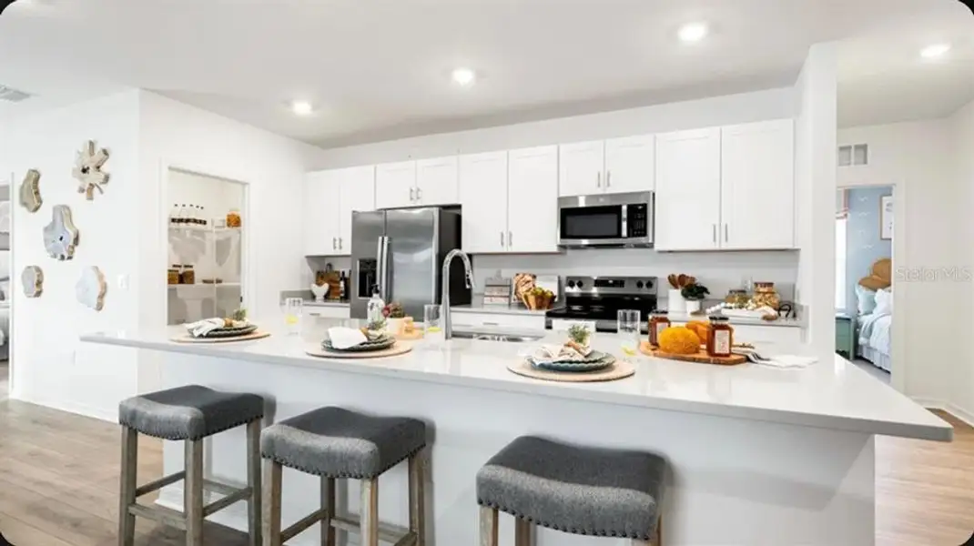 Furnished interior view inside a new home in Waterstone, Groveland (Image 7).