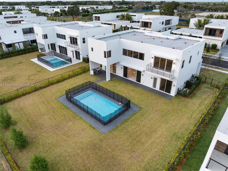 Exterior details and patio area of a home in , Weston (Image 32).