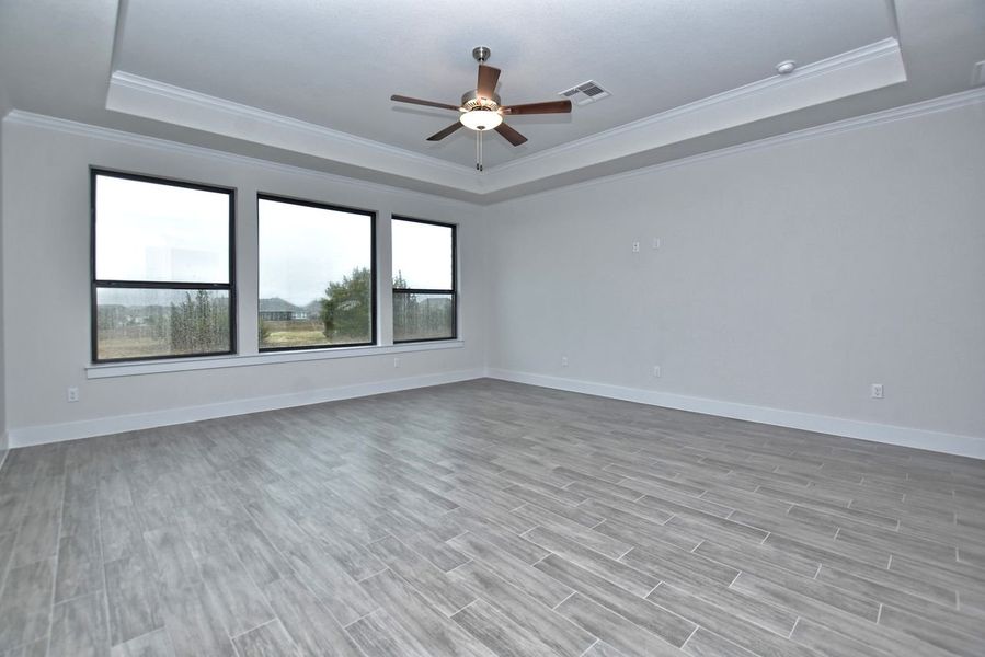 Representative unfurnished interior of a home built from the Avalon by Giddens Homes in Scofield Farms Estates, Georgetown (Image 139).