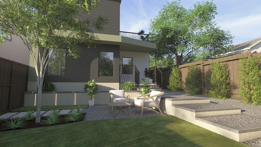 Fenced backyard with a patio and a balcony