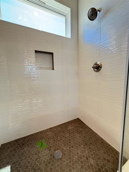 Bathroom with a tile shower
