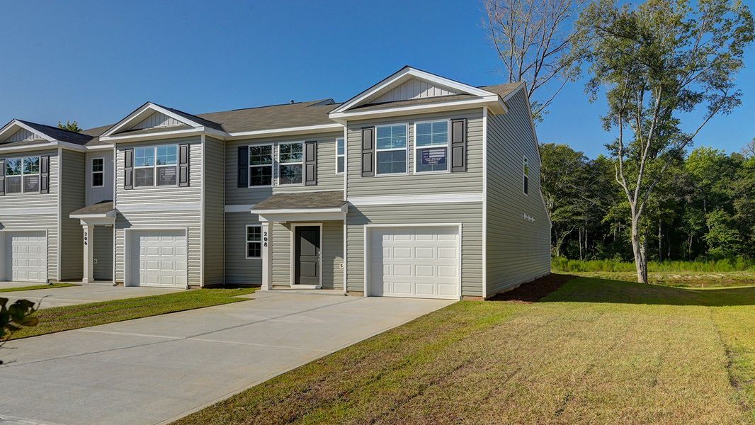 Representative exterior photo of a completed home built from the Norman by D.R. Horton in McKenzie Gardens, Brunswick, GA (Image 2). Representative exterior photo of a completed home built from the Norman by D.R. Horton in McKenzie Gardens, Brunswick, GA (Image 2).