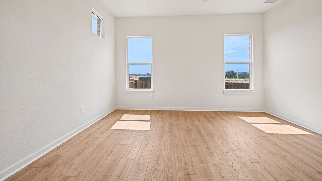 Spacious, unfurnished interior of a new home in The Enclave at Bar W Ranch, Leander (Image 42).