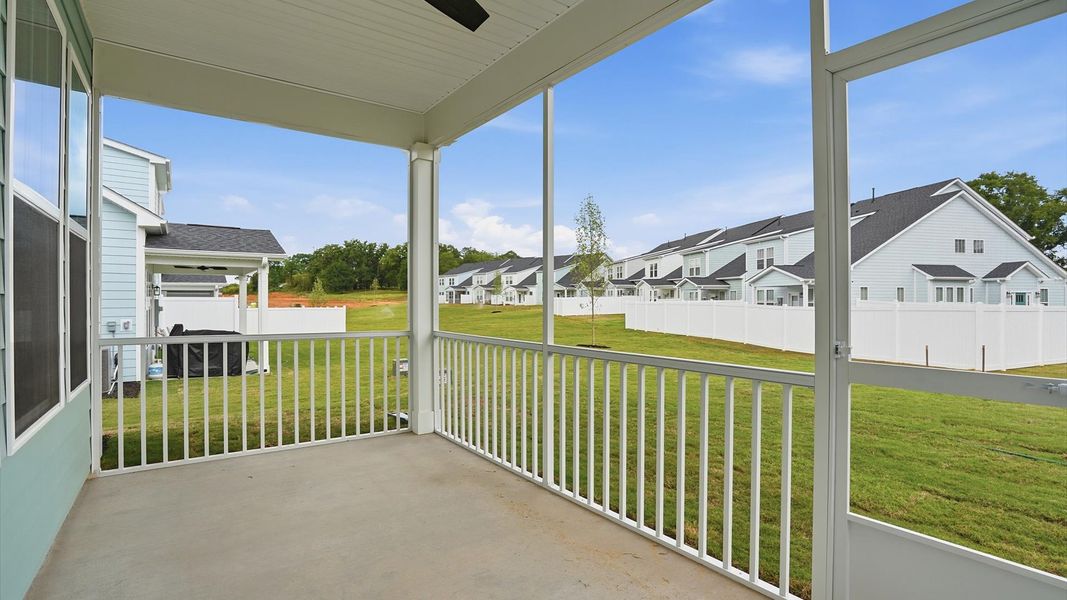 Exterior details and patio area of a home in Village at Midway, Anderson (Image 20).