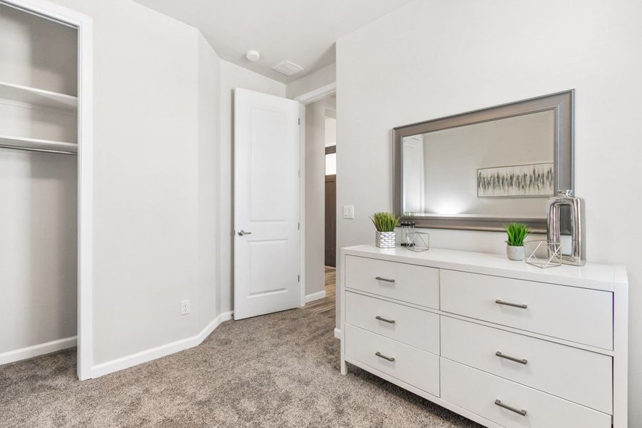 Representative furnished interior of a home built from the Valencia by Hakes Brothers in Hillside Park, El Paso (Image 29).