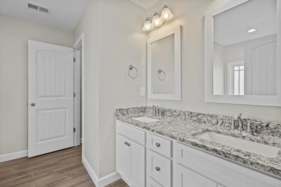 Representative furnished interior of a home built from the Brentwood by Enchanted Homes in Mills Gin, Campobello (Image 5).