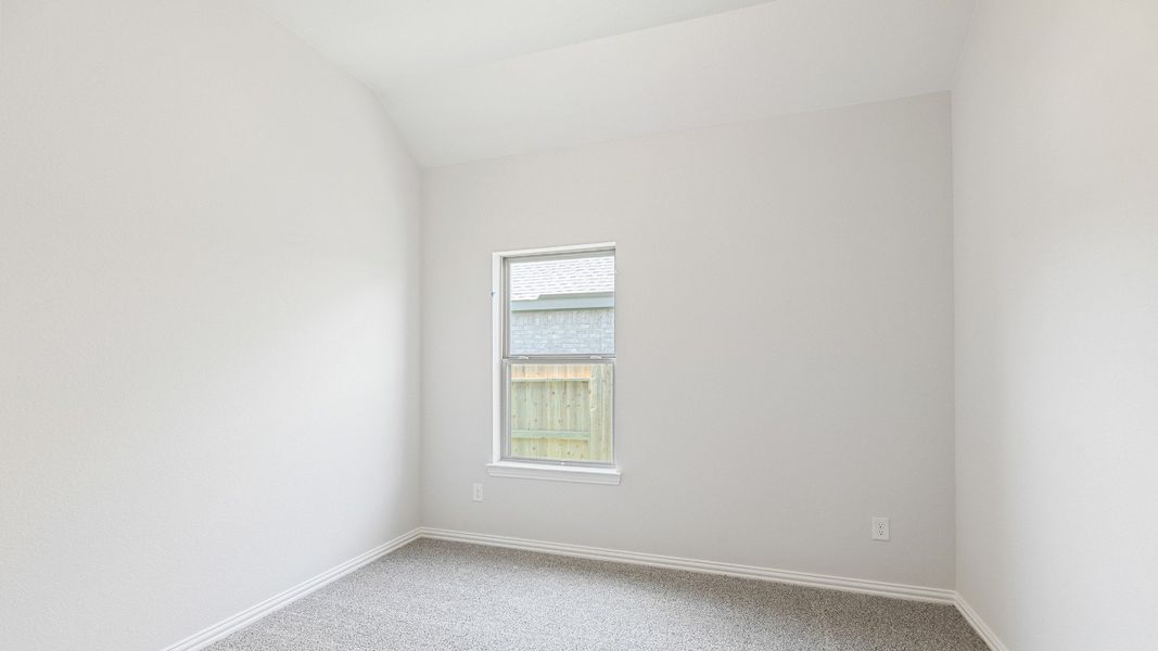 Furnished interior view inside a new home in Sunterra, Katy (Image 13).