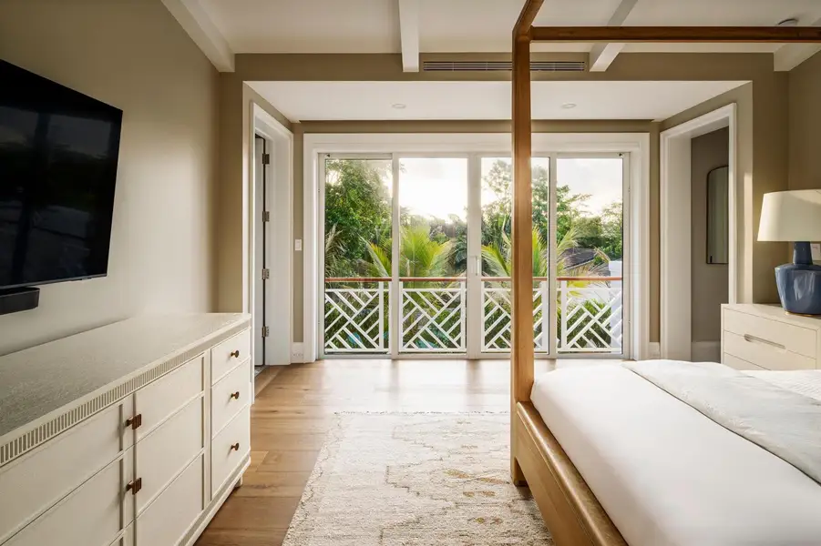 31 - Master bedroom with canopy bed, whi
