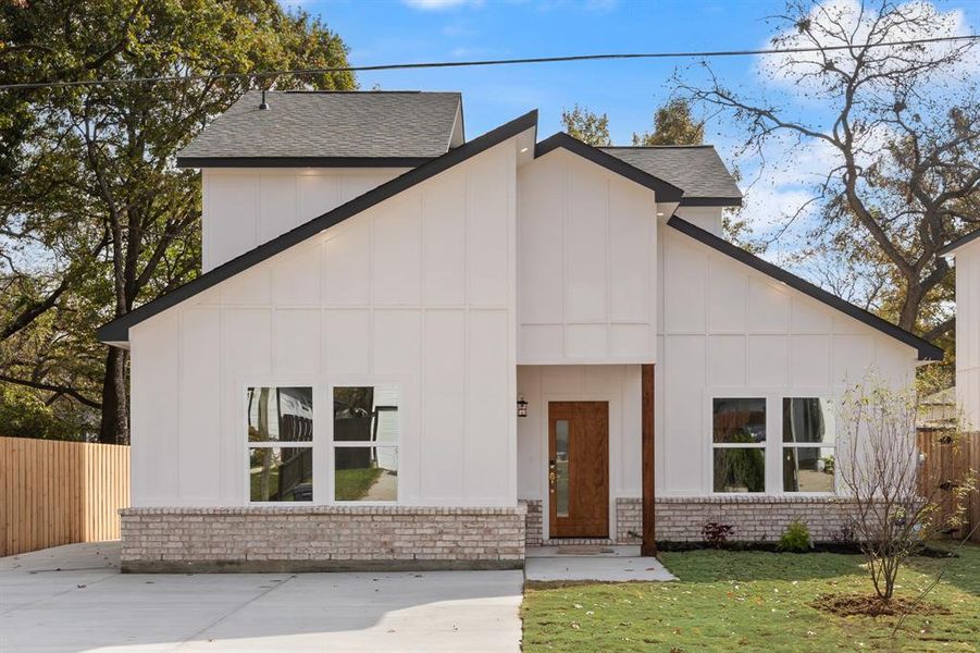 Front exterior of a new home in , Dallas, TX, highlighting curb appeal (Image 25).