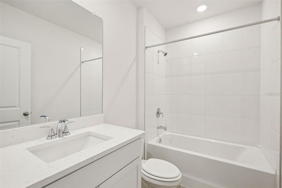 Furnished interior view inside a new home in The Grove at Stuart Crossing - Classic Series, Bartow (Image 12).