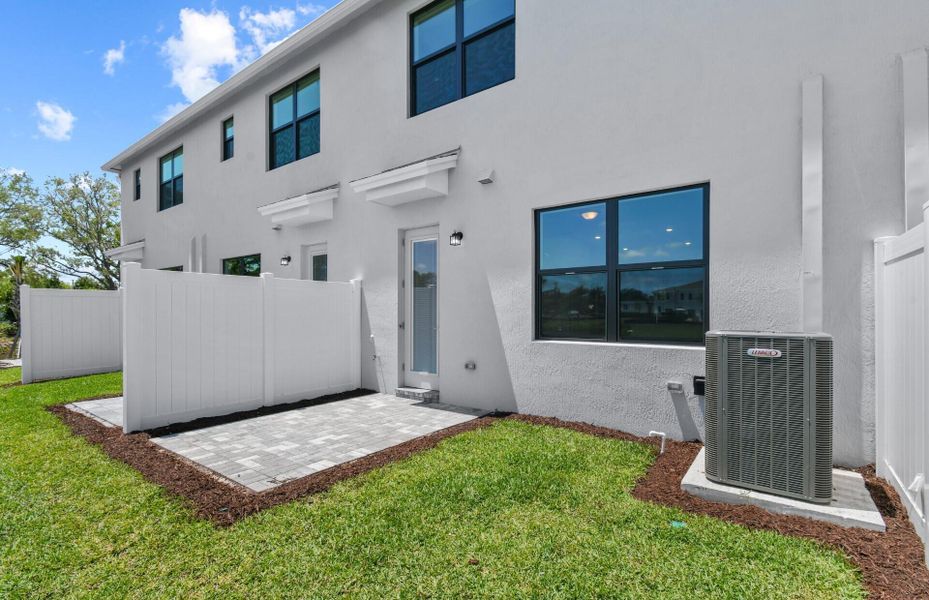 Exterior details and patio area of a home in Camellia, Stuart (Image 2).