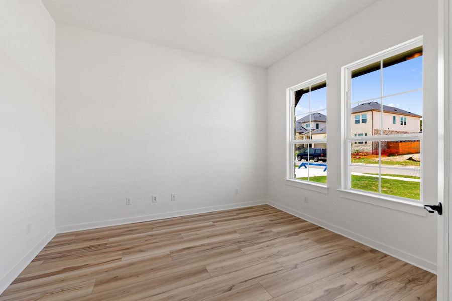 Spacious, unfurnished interior of a new home in Heritage, Dripping Springs (Image 27).