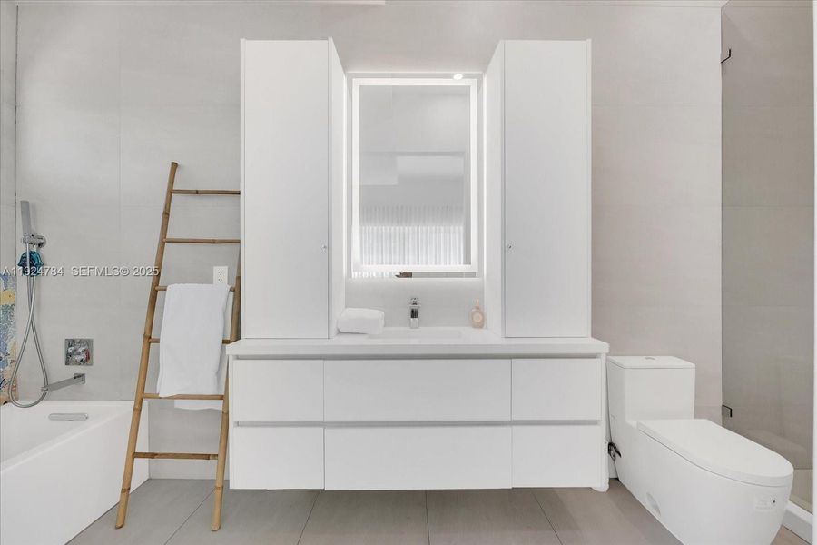 Furnished interior view inside a new home in , Miami Beach (Image 14). Furnished interior view inside a new home in , Miami Beach (Image 14).