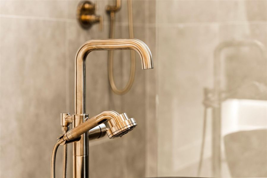 Bathroom view of a shower with shower door Bathroom view of a shower with shower door