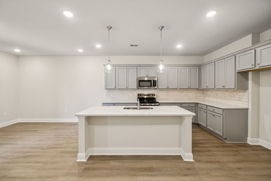 Representative furnished interior of a home built from the Magnolia by Ashton Woods in Stewart's Glen | 55+ Community, Smyrna (Image 4).