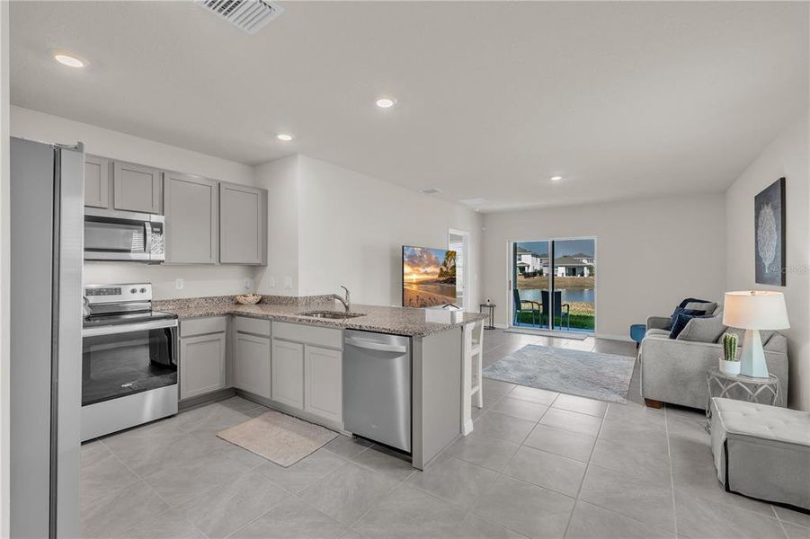 Furnished interior view inside a new home in Star Farms at Lakewood Ranch, Bradenton (Image 7).