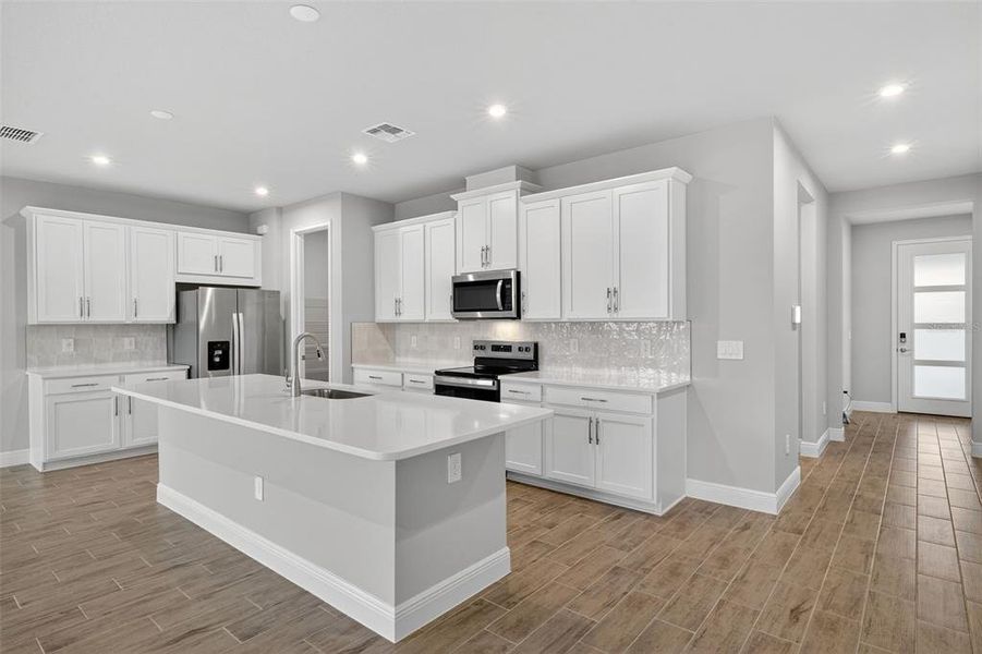 Furnished interior view inside a new home in Windwater, Parrish (Image 6).