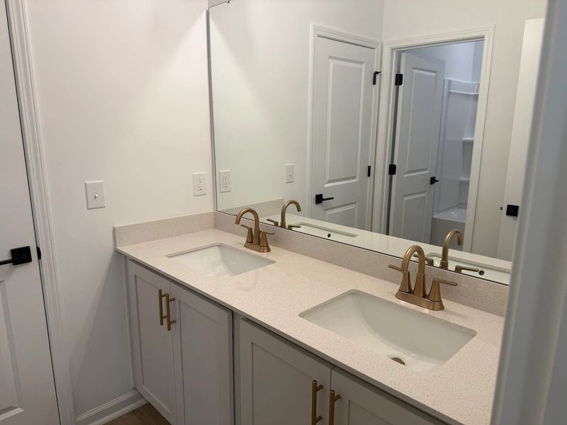 Bath 3 featuring the AW Collection® Serene - Earth-toned surfaces bring warmth and calm.