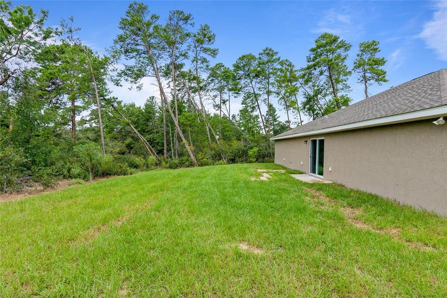 Exterior details and patio area of a home in Marion Oaks, Ocala (Image 2).