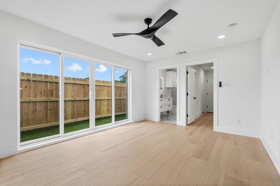 Unfurnished bedroom featuring recessed lighting, visible vents, light wood finished floors, and baseboards