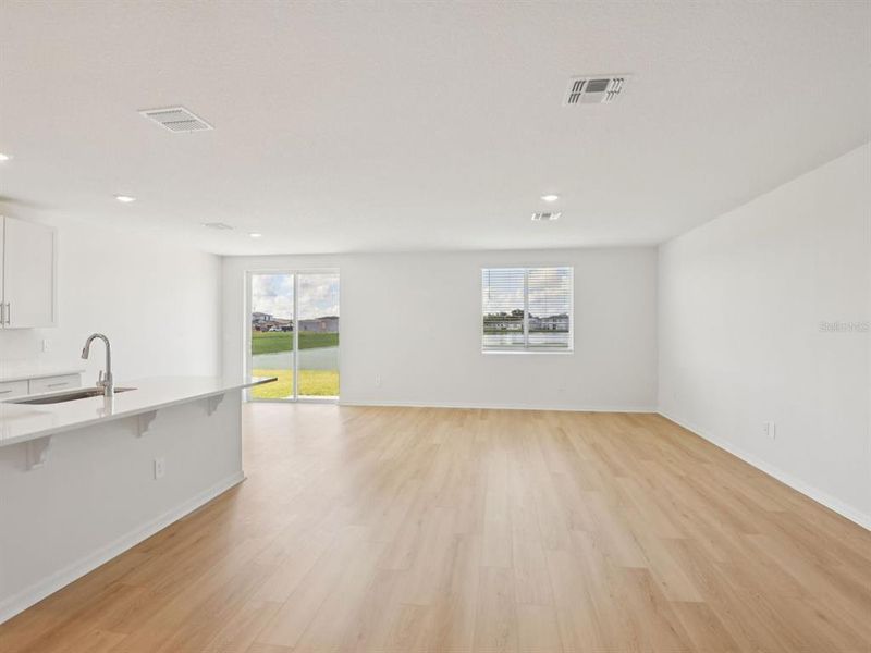 Spacious, unfurnished interior of a new home in The Grove at Stuart Crossing - Classic Series, Bartow (Image 13). Spacious, unfurnished interior of a new home in The Grove at Stuart Crossing - Classic Series, Bartow (Image 13).