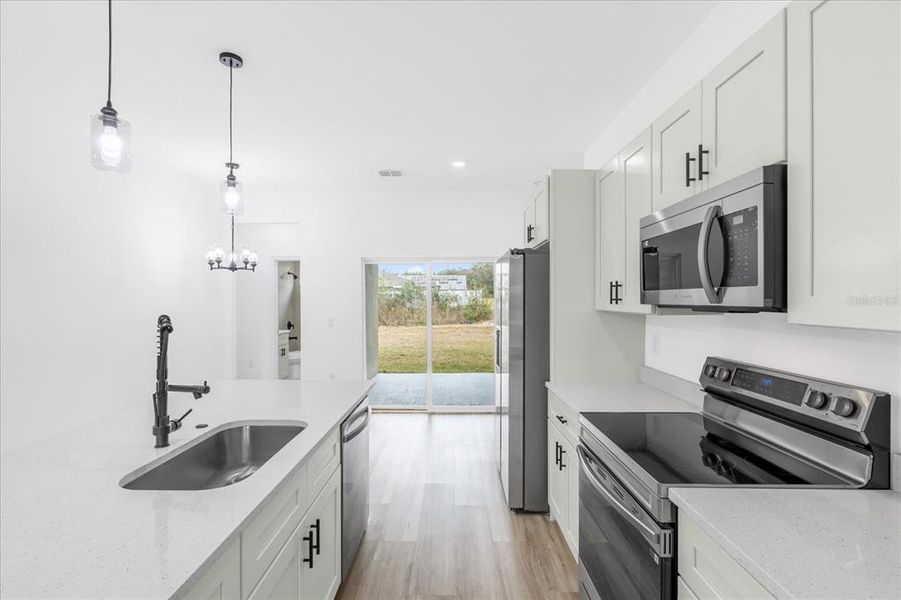 Furnished interior view inside a new home in , Ocala (Image 13).