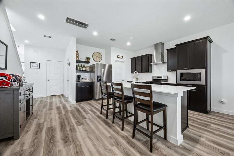 View of kitchen, convenient to the garage and powder bath! Large, walk-in pantry right of the refrigerator. The lay-out is functional for cooking and convenience! View of kitchen, convenient to the garage and powder bath! Large, walk-in pantry right of the refrigerator. The lay-out is functional for cooking and convenience!