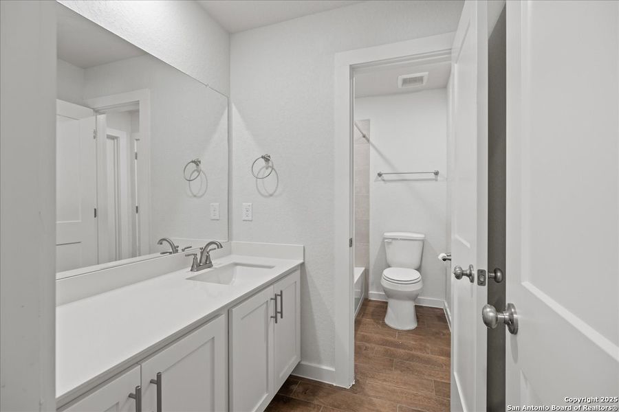 Furnished interior view inside a new home in August Fields, New Braunfels (Image 7).