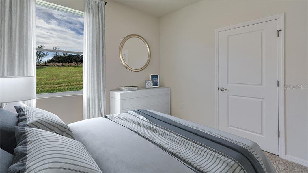 Furnished interior view inside a new home in Twisted Oaks, Wildwood (Image 9).