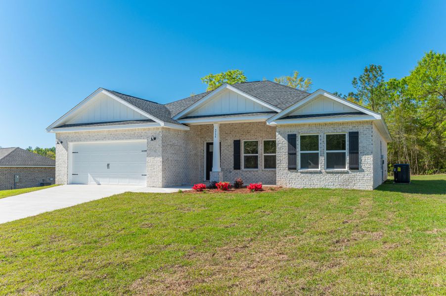 Front exterior of a home in the Southern Day Chateau community, located in Baker, FL (Image 1).