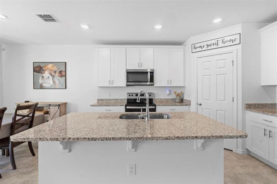 Furnished interior view inside a new home in Deer Run at Crosswinds, Davenport (Image 19).