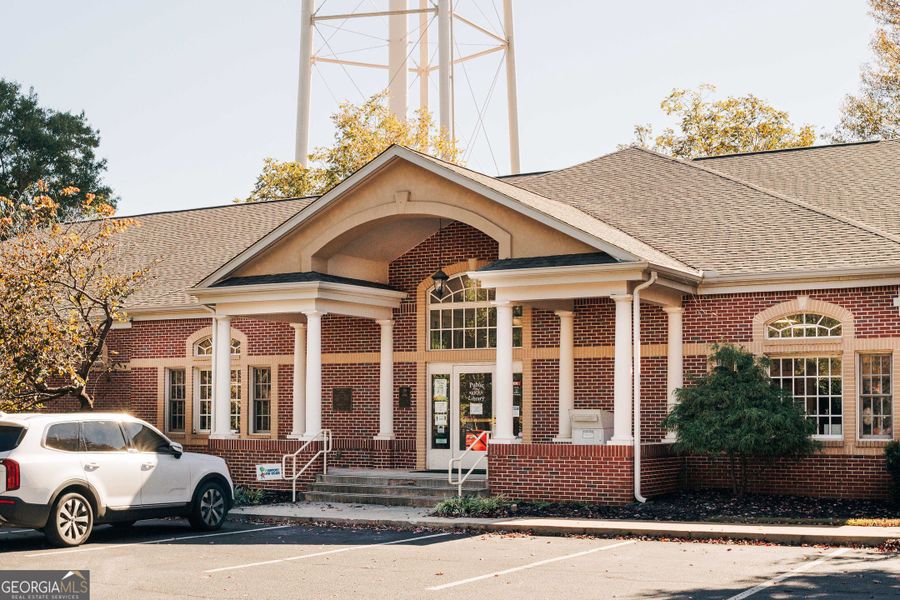 Front exterior of a new home in Summerlin, Winder, GA, highlighting curb appeal (Image 27). Front exterior of a new home in Summerlin, Winder, GA, highlighting curb appeal (Image 27).