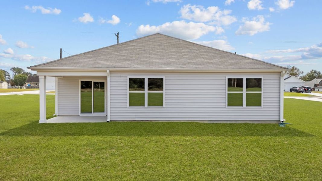 Exterior details and patio area of a home in Wilson's Ridge, Wilson's Mills (Image 3).