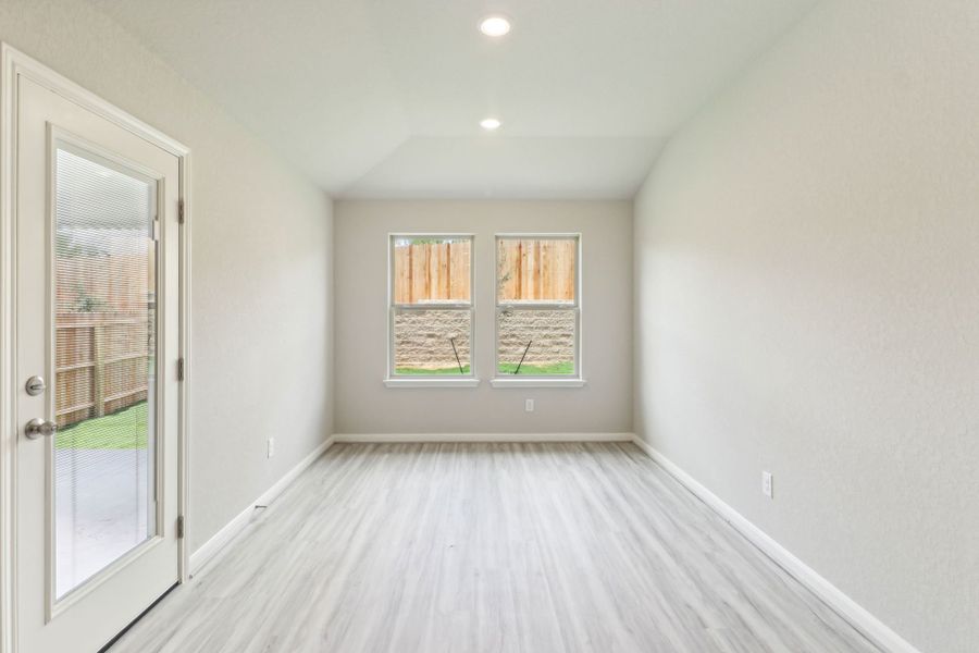 Dining room in the Callaghan floorplan at a Meritage Homes community.