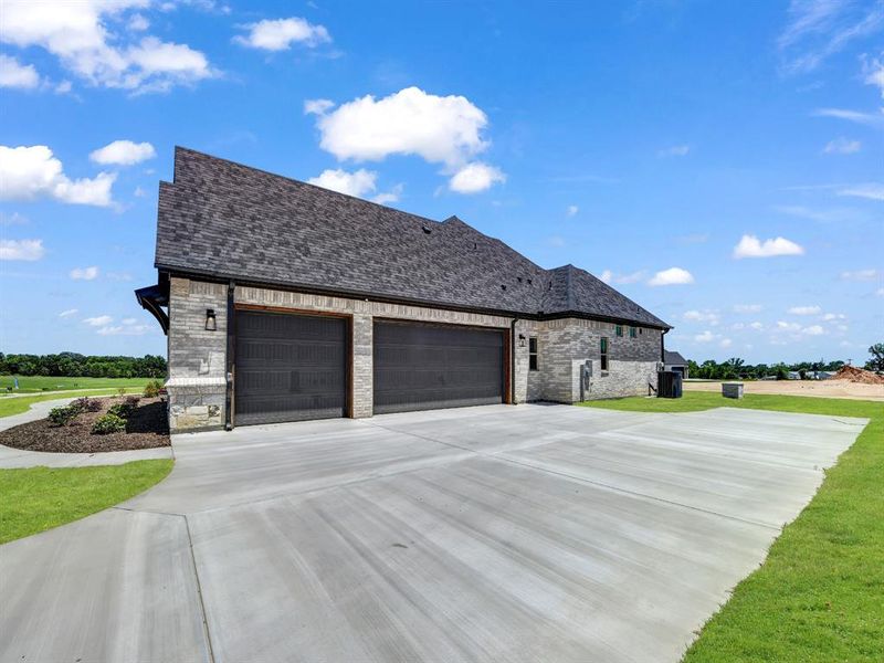 Front exterior of a new home in , Weatherford, TX, highlighting curb appeal (Image 25).
