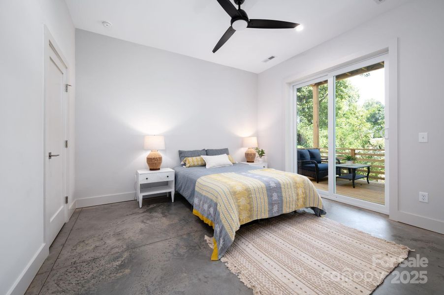 Lower Level Bedroom Suite with Features Covered Deck Access Lower Level Bedroom Suite with Features Covered Deck Access