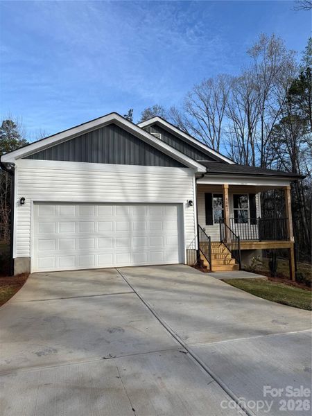 Front exterior of a new home in , Lancaster, SC, highlighting curb appeal (Image 26).