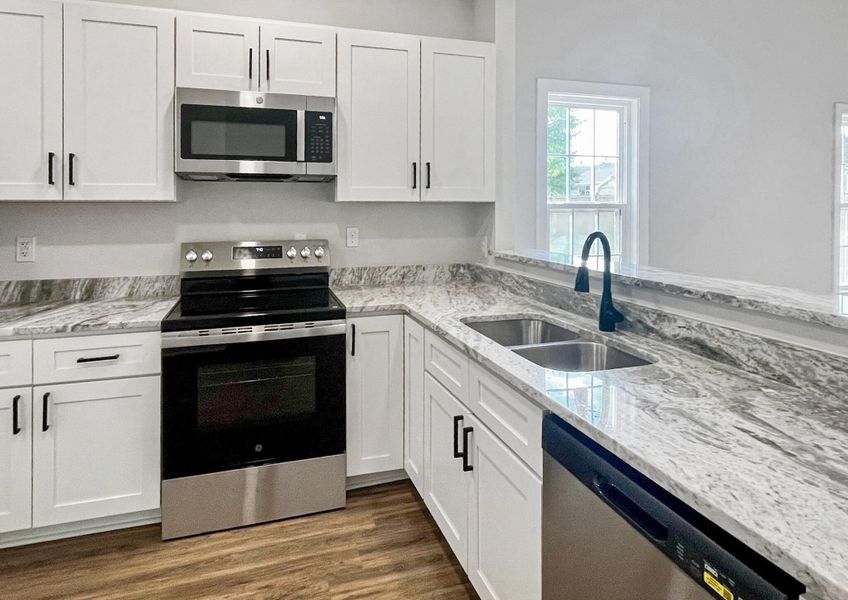 Furnished interior view inside a new home in , St. Stephen (Image 8).