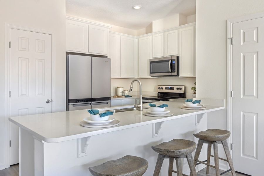 Furnished interior view inside a new home in Orchard Park Townhomes, St. Augustine (Image 8).