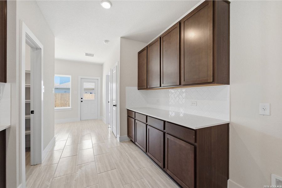 Furnished interior view inside a new home in Swenson Heights, Seguin (Image 4).