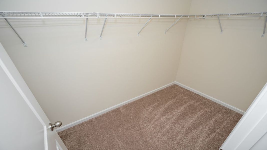 Spacious, unfurnished interior of a new home in The Pines at Blake Farm, Wilmington (Image 33).