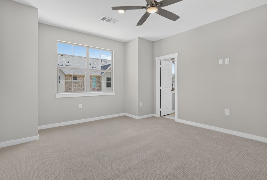 Spacious, unfurnished interior of a new home in The Tribute, The Colony (Image 39).