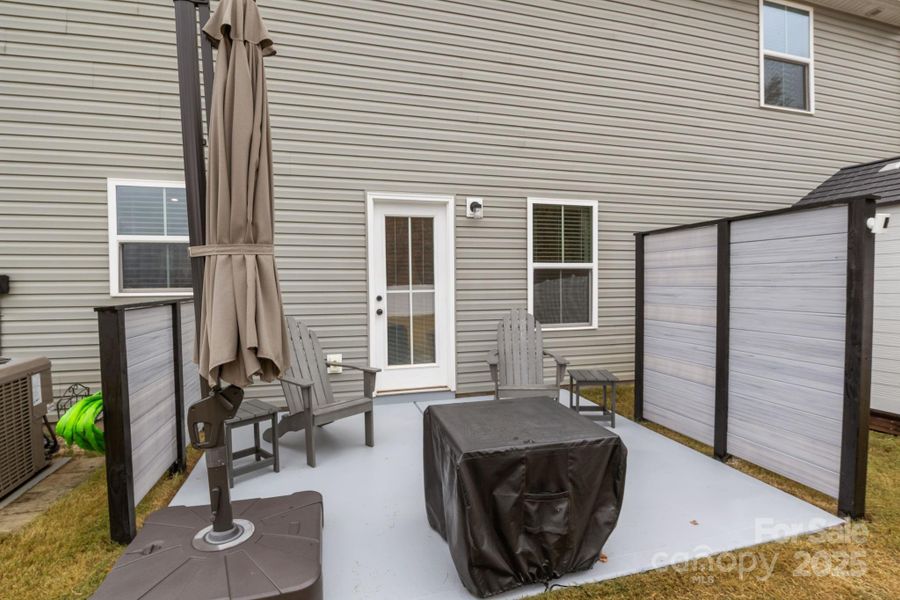 Exterior details and patio area of a home in , Troutman (Image 27).