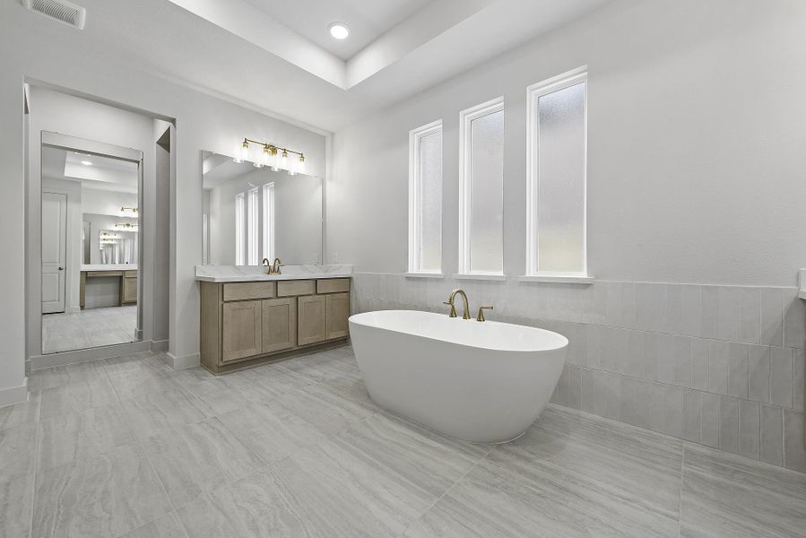 Furnished interior view inside a new home in Bridgeland, Cypress (Image 12).