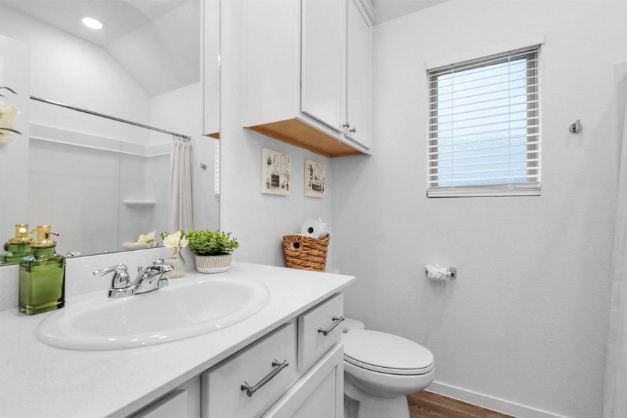 Hall bathroom with combined tub/shower