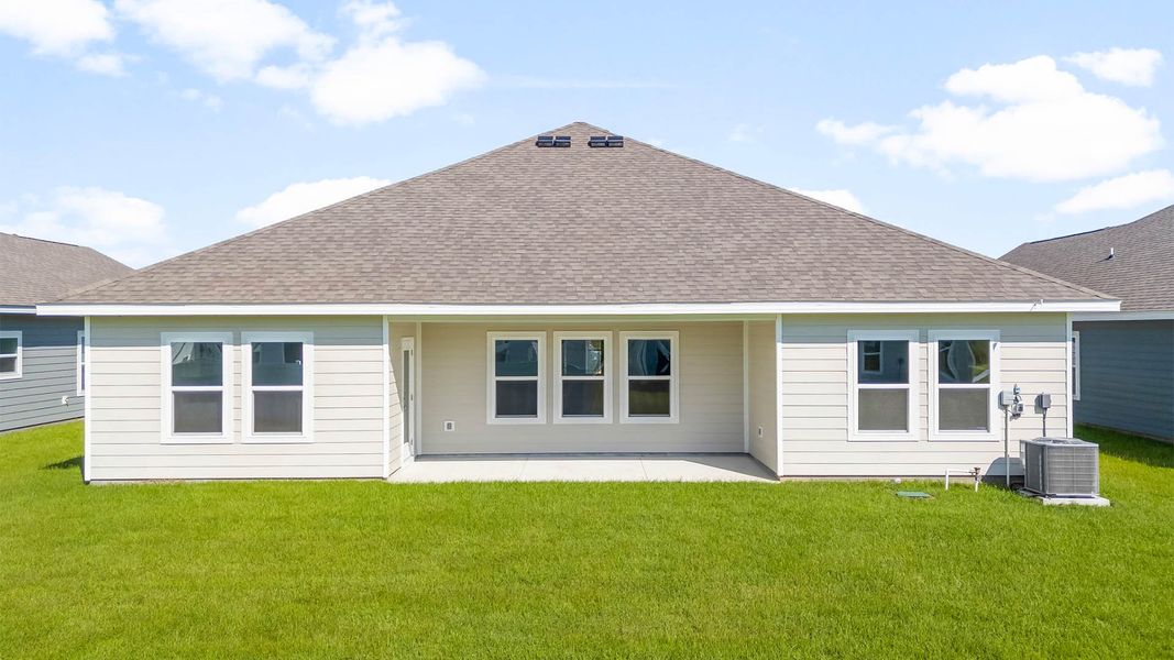 Front exterior of a new home in Liberty, Panama City, FL, highlighting curb appeal (Image 20). Front exterior of a new home in Liberty, Panama City, FL, highlighting curb appeal (Image 20).