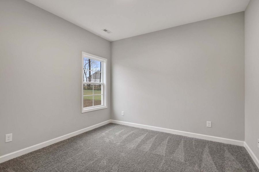 Representative unfurnished interior of a home built from the Garland by Caviness & Cates Communities in Bartlett Manor, Youngsville (Image 241). Representative unfurnished interior of a home built from the Garland by Caviness & Cates Communities in Bartlett Manor, Youngsville (Image 241).
