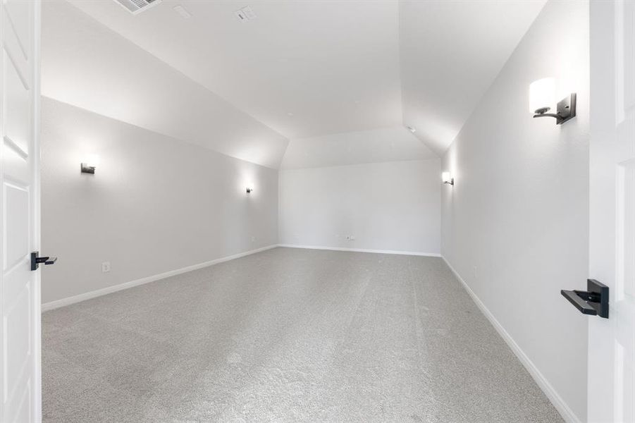 This spacious media room with adjacent game room create the ultimate family entertainment zone! This spacious media room with adjacent game room create the ultimate family entertainment zone!