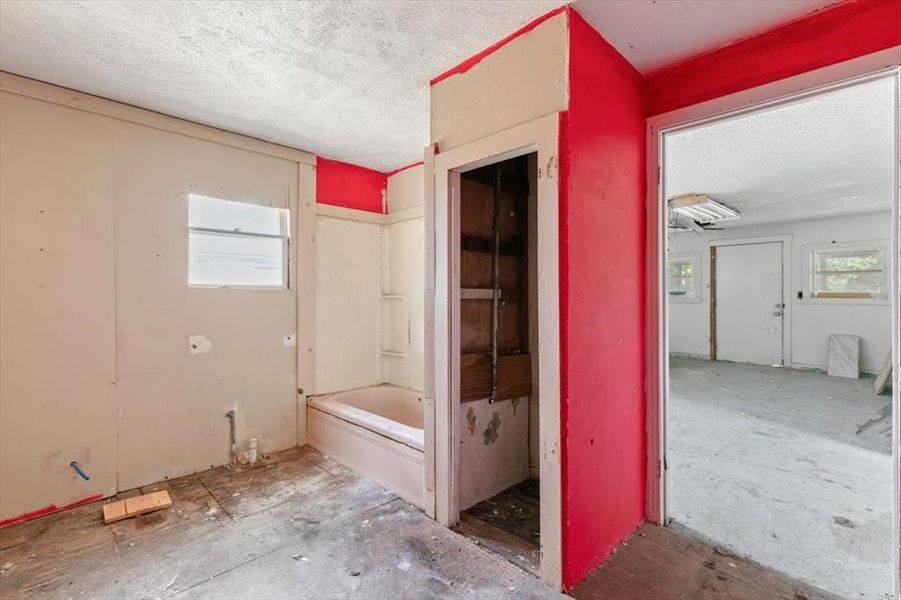 Bathroom featuring a textured ceiling Bathroom featuring a textured ceiling